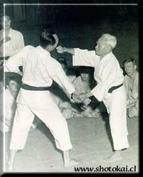 Master Gichin Funakoshi with senior disciples